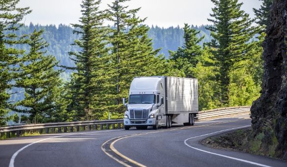 truck driving on road